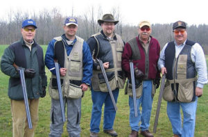 Five men in hunting clothing with shotguns | MRC MEC shooting event